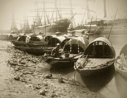 Sampans on the Hooghly River. A number of small sampans are tied up on the banks of the Hooghly