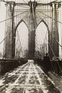 "The Spider Web on Brooklyn Bridge". View along the pedestrian path of Brooklyn Bridge. A printed