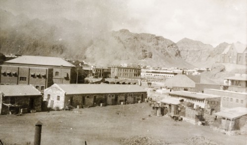 Riot damage in Aden, 1947. A plume of smoke rises from a building in the Jewish quarter of Aden,