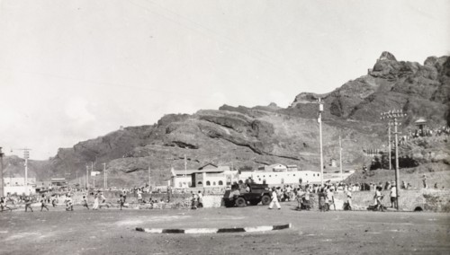Patrols during the Arab riots in Aden, 1947. A light armoured vehicle patrols a street in Aden,
