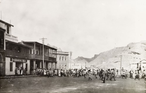 Rioting in Aden, 1947. Crowds of people fill a street in Aden during Arab riots that took place in