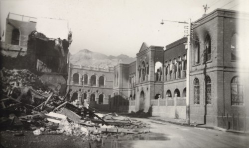 Street destroyed during Arab riots in Aden, 1947. View down a street in the Jewish quarter of Aden,