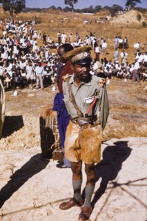 Policeman at United National Indepence Party rally. A policeman on watch at a United National