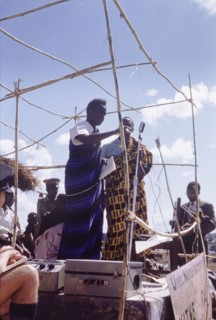 Kenneth Kaunda at United National Independence Party rally. Kenneth Kaunda (born 1924) steps up to