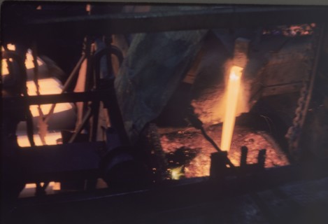 Pouring copper at Nkana-Kitwe mines. Copper is poured into a furnace during the refining process at