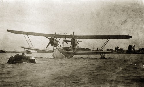Flying boat, Nigeria. The flying boat 'Singapore', piloted by Sir Alan Cobham, is secured to a buoy
