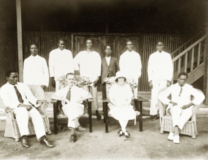The Baxendales with Miller Brothers' staff. Mr and Mrs Baxendale (centre) pose for the camera with