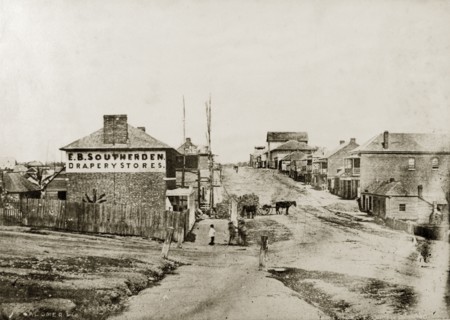 Queen Street and a drapery store. Queen Street, taken from the corner of Edward Street looking