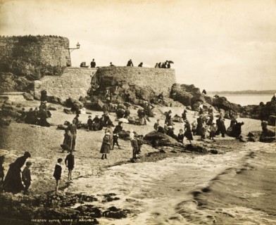 Beach at Weston-super-Mare. English families on holiday crowd the beach at Anchor Head.