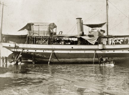 Armed launch 'Miner' awaits repairs. Armed launch boat 'Miner', a vessel belonging to the Persian