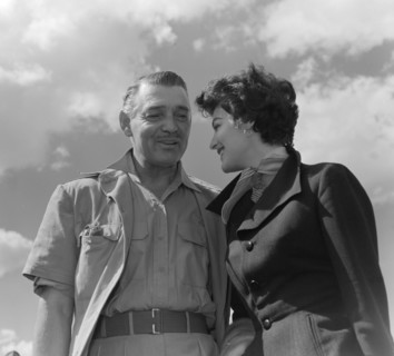 Clark Gable and Ava Gardner. Hollywood film stars Clark Gable and Ava Gardner share a private joke