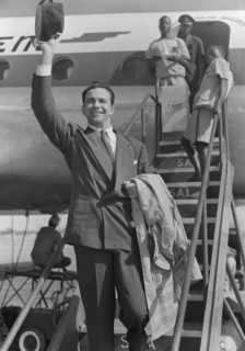 John Bentley arrives in Nairobi. Hollywood film star John Bentley waves his trilby hat as he