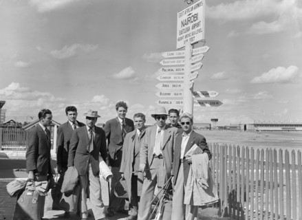 French athletics team. Members of a French athletics team pose beneath a signpost on their arrival