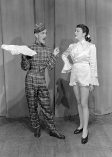 Cast of Cinderella. Two performers in character as Dandini and Buttons from Cinderella. Kenya, 12