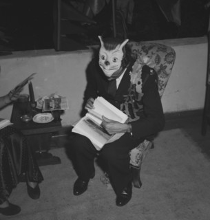 Ron Richardson with mask. Ron Richardson takes a break from the merriment at the Archer's New