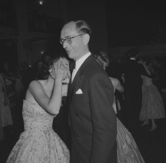 Guests at the Limuru Hunt Ball. A couple dancing at the Limuru Hunt Ball react to the camera: the