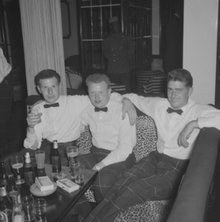 Three Cameronians. Three young Cameronians enjoy themselves at the Equator Club. Dressed in