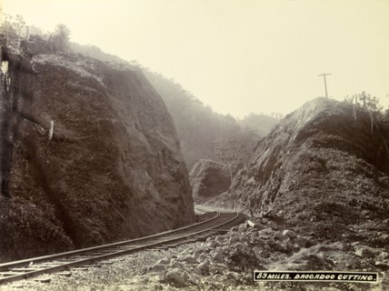 Track at 'Brocadoo Cutting'. A newly completed railway track winds around boulders at 'Brocadoo