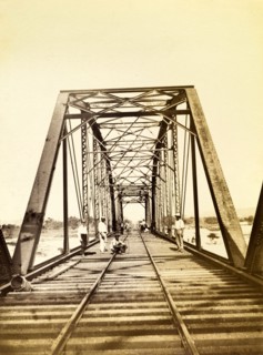 Construction workers on a bridge. Construction workers pictured on a newly completed railway bridge