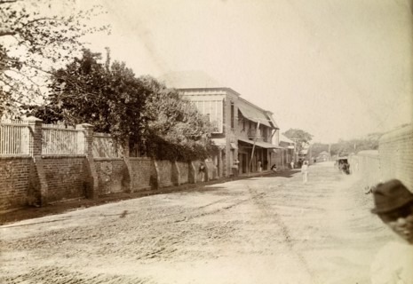 Kingston tram lines. Rails laid down for mule-drawn trams stretch into the distance along a long,