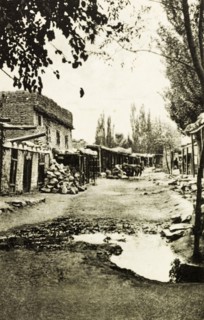 Skardu bazaar. Ramshackle buildings line the street at Skardu bazaar. Skardu, India (Pakistan),