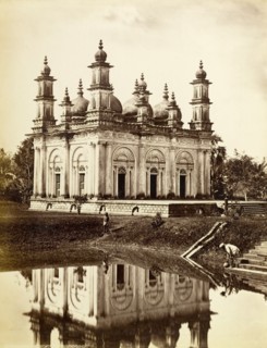 The Shahbani Begum mosque. The decorative domes of the Shahbani Begum mosque are reflected in the