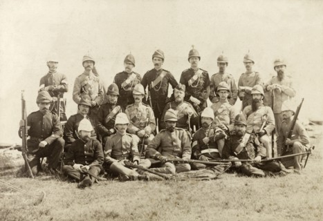 Wimbledon rifle team. 21 European and Indian members of a rifle team pose for a group portrait with