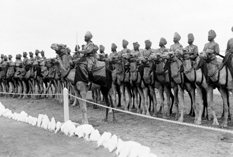 Royal camel escort at Aden. An Indian Army camel escort for King George V and Queen Mary. The royal