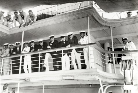 On board entertainment. King George V (r.1910-36) is entertained by a pillow fight aboard HMS