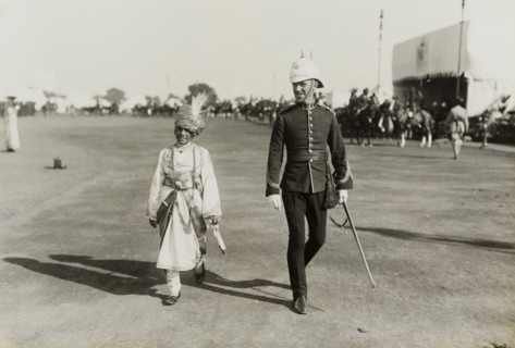 The Maharajah of Bharatpur. The Maharajah of Bharatpur accompanies a British officer across open