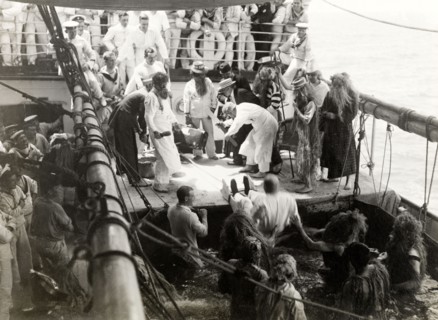 Antics aboard the S.S. Balmoral Castle. Crew members aboard the S.S. Balmoral Castle clown about on