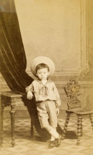 Juanito', aged three years. Studio portrait of a young boy named 'Juanito', aged three years.