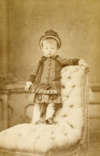 Juanito', aged 18 months. Studio portrait of a young boy named 'Juanito', aged 18 months.