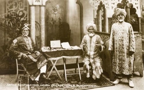 Soothsayers at Blackpool Tower. A good example of Orientalism, this image shows three Indian men