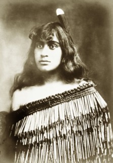 Young Maori woman. Studio portrait of a young Maori woman whose traditional dress has been made
