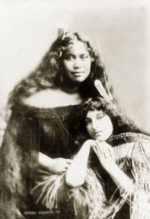 Two Maori women. Studio portrait of two young Maori women whose traditional dress has been made