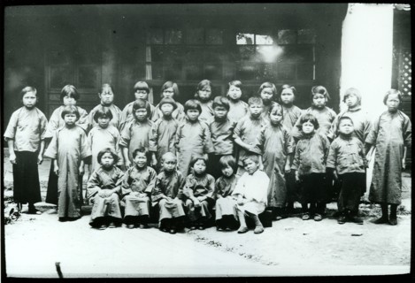 Children freed from 'mui tsai'. Portrait of a group of child slaves, freed from domestic servitude