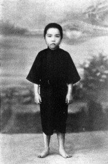 The last child sold in Hong Kong. Portrait of a child slave, freed from domestic servitude under