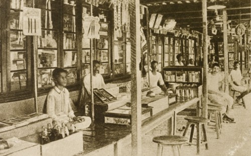 Bazaar at Calcutta. Traders wait for customers at a bazaar. Their stalls appear to be located
