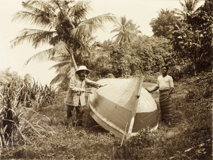 Painting the underside. A British Primitive Methodist missionary worker paints the underside of a