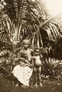 Inhabitants of Bioko. Portrait of a woman from Bioko with her two young children. Bioko, Equatorial