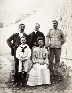 Group portrait in Gibraltar. Group portrait featuring three men, a women and a child. This is one