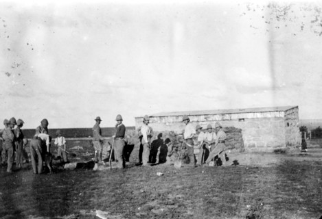 A fatigue party digging, South Africa. A group of officers in the East Surrey Regiment, dig the