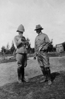Two officers smoking, South Africa. Two uniformed British Army officers enjoy a cigarette outdoors