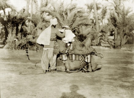 Margaret Lawrence prepares to ride a camel. Margaret Lawrence (b.1904), the daughter of Phyllis and