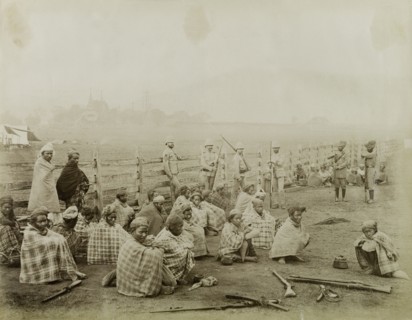 Burmese rebels surrender at Wuntho. Captured Burmese rebels surrender their arms to British forces