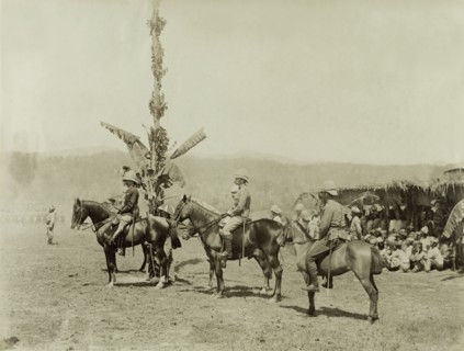 General Wolseley inspects troops. General Wolseley and other senior British Army officers sit