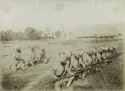 Practising a shooting stance. Turbaned Indian Military and Civil Police officers practice their