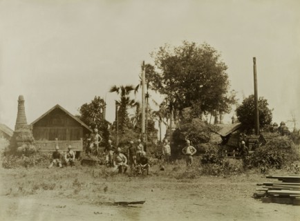 Soldiers at a deserted shrine. British Army soldiers pose informally at a deserted shrine