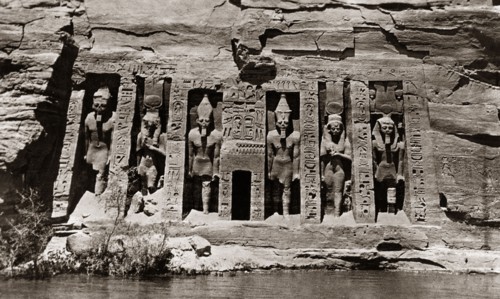 Carvings at the Abu Simbel rock temples. Ancient Egyptian hieroglyphs and figures are carved into a